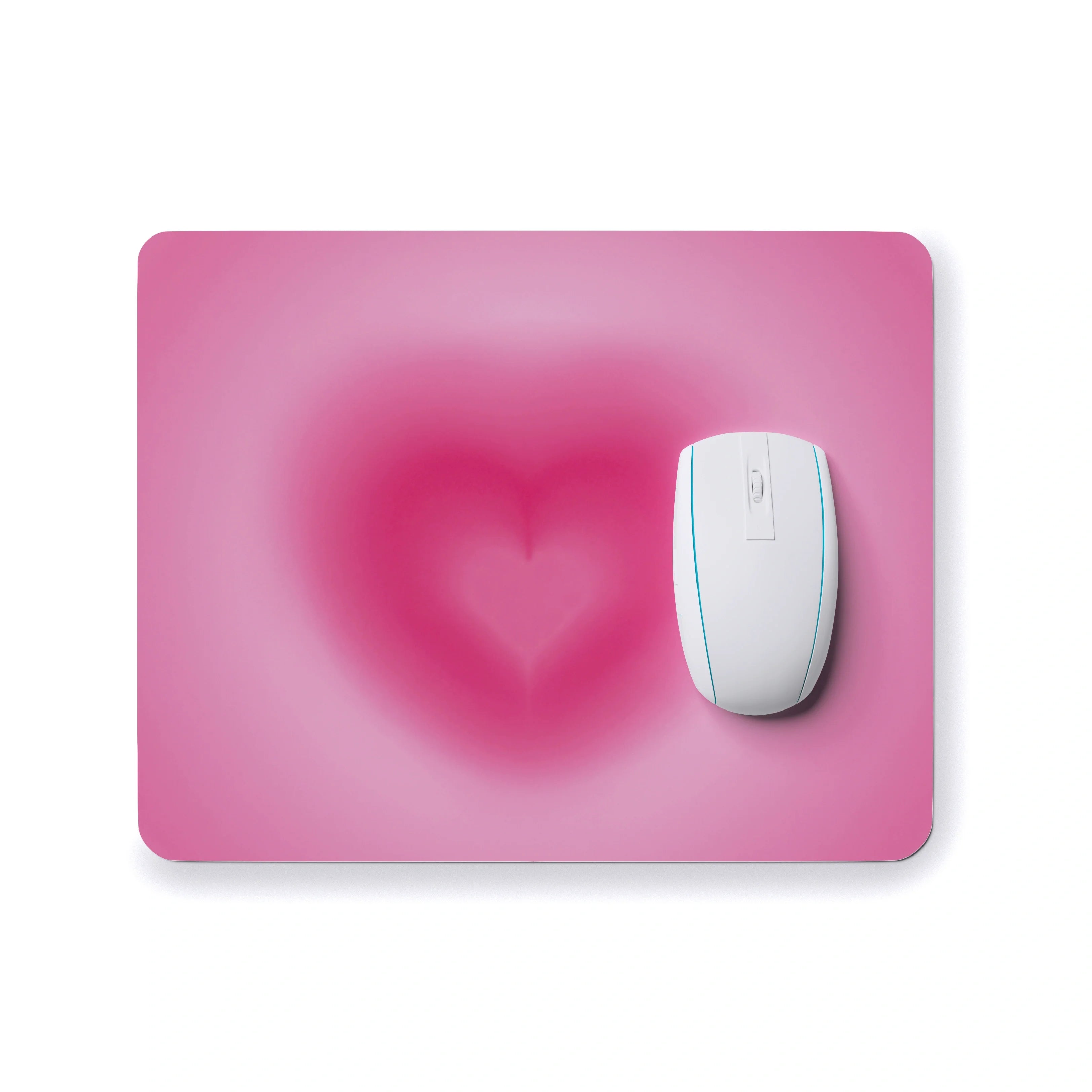 Pink mouse pad with a heart design 
